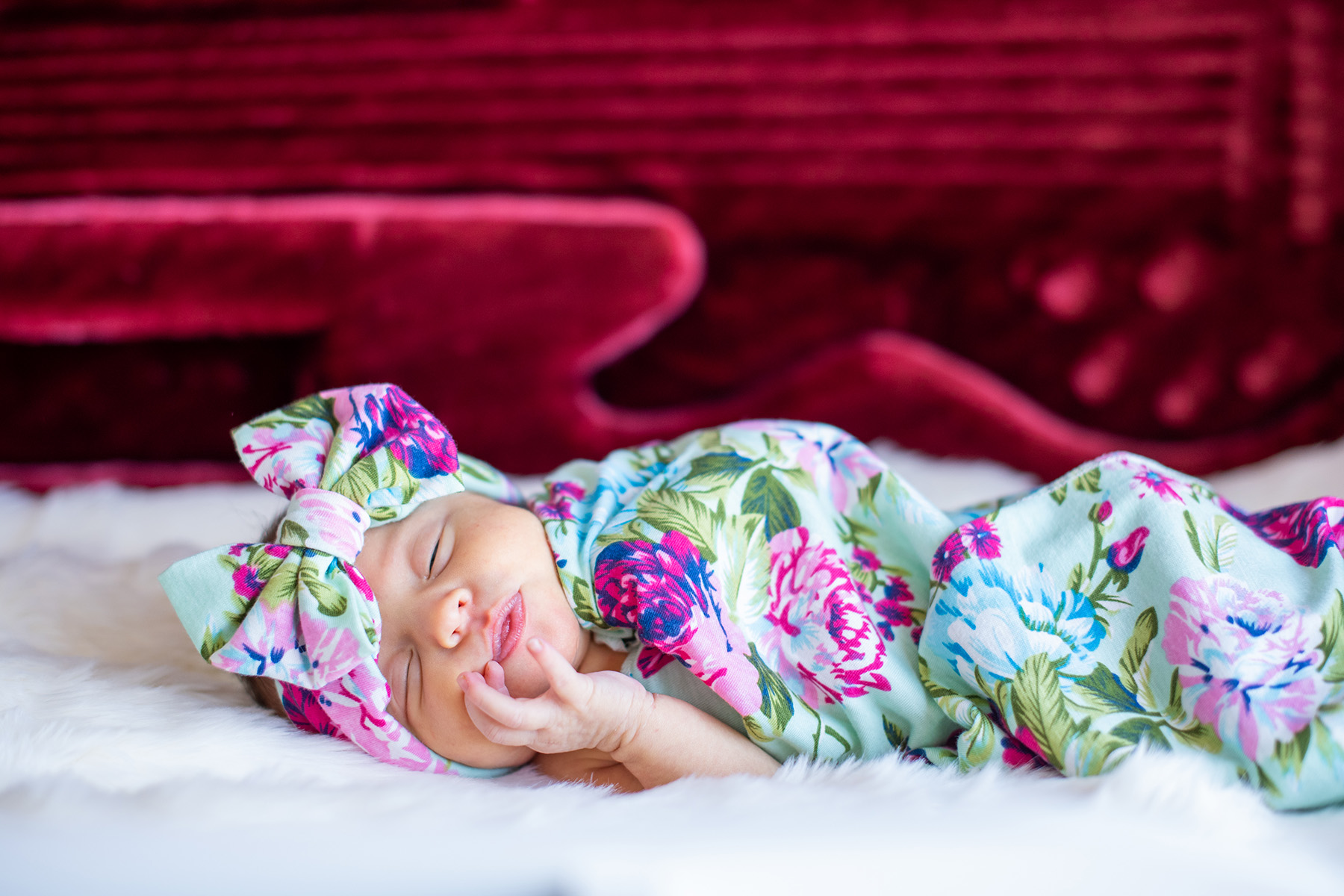 photo of new born in bass guitar case